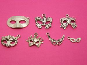 The Mask Collection - 7 different antique silver tone charms