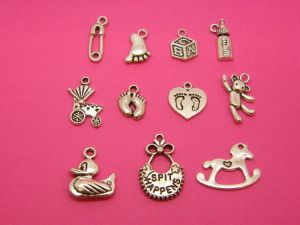 The Baby Collection - 11 antique silver tone charms