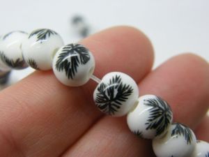 40 Flower beads  9 x 8mm white ceramic B230