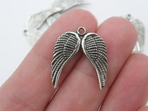 8 Angel wing charms antique silver tone AW35