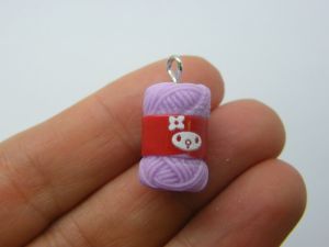 2 Balls of wool yarn pendants purple resin P174