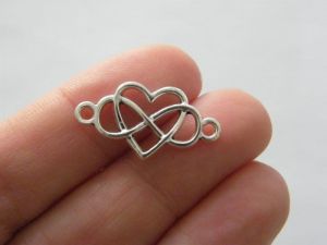 10 Infinity heart charms silver tone I173