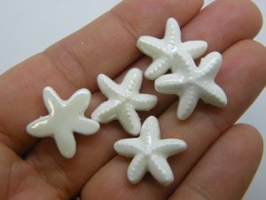 8 Starfish beads white ceramic FF531
