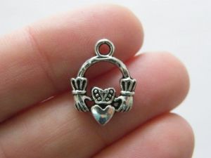 10 Hand heart crown charms antique silver tone R30