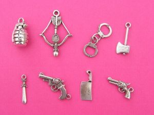 The Action Collection - 8 different antique silver tone charms