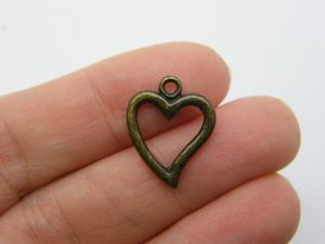 10 Heart charms antique bronze tone H159