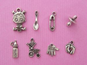 The Baby Girl Collection - 8 different antique silver tone charms