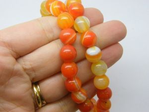 35 Agate assorted orange 10mm beads B141