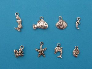 The Mermaid Collection - 8 different antique silver tone charms