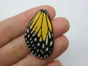 4 Butterfly wing pendants acrylic A1157