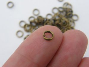 200 Split rings 5mm antique bronze tone