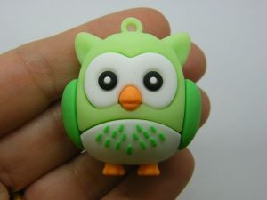 4 Owl pendants green PVC plastic B