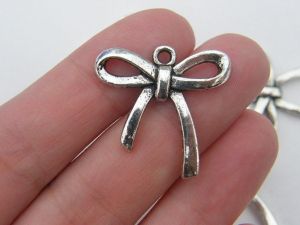 6 Bow charms antique silver tone CT125
