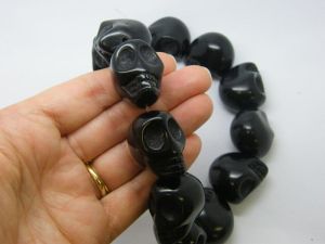 13 Super stunningly large skull beads black HC