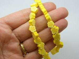 36 Flower beads yellow polymer clay B234