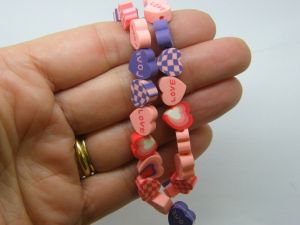 38 Heart red pink purple beads polymer clay B261
