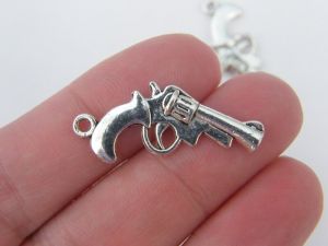 8 Gun charms antique silver tone G2