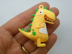 4 Dinosaur pendants green PVC plastic 02D