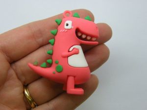 4 Dinosaur pendants red PVC plastic 02B