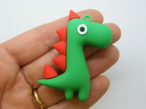 4 Dinosaur pendants green PVC plastic 05