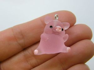 4 Pig sitting down charms pink resin A353