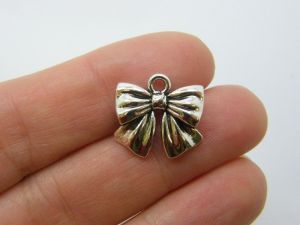 6 Bow charms antique silver tone CT27