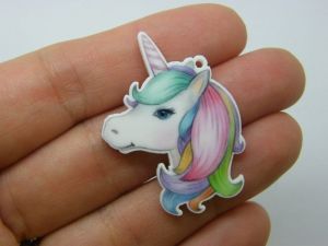 4 Unicorn charms white acrylic A414