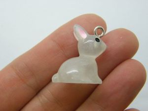 4 Rabbit pendants clear glow in the dark resin A386