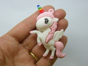 4 Unicorn pendants pink white PVC plastic A