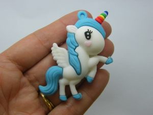 4 Unicorn pendants blue white PVC plastic A