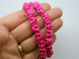 38 Pink fuchsia skull beads 10 x 8mm synthetic turquoise SK22