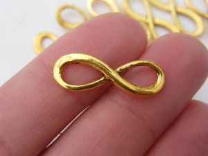 12 Infinity charms or connectors antique gold tone I169