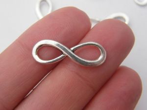 12 Infinity charms or connectors antique silver tone I1