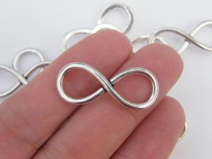 8 Infinity charms or connectors antique silver tone I5