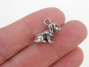 8 Dog charms antique silver tone A893