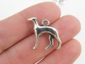 6 Dog charms antique silver tone A884