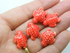 8 Turtle beads orange red porcelain FF549