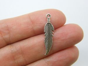 10 Feather pendants antique silver tone B20