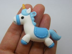 4 Unicorn pendants blue white PVC plastic A 02B