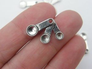 8 Measuring spoon charms antique silver tone FD89