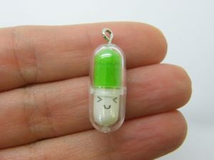 6 Face capsule in a capsule charms green white clear plastic M189