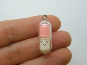 6 Face capsule in a capsule charms  pink white clear plastic M214