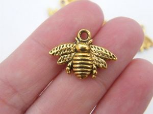 BULK 50 Bee charms antique gold tone A564