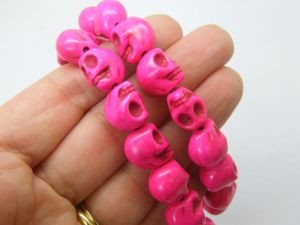 32 Skull beads fuchsia pink 12 x 10mm synthetic turquoise SK25