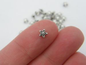 BULK 400 Star  spacer beads 4mm antique silver tone S22