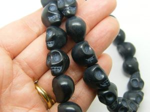 22 Black skull beads 15 x 12mm SK16