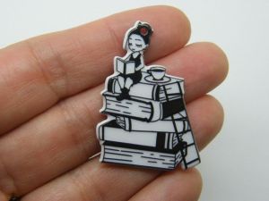 2 Reading  on top of a pile of books pendants black white acrylic P45