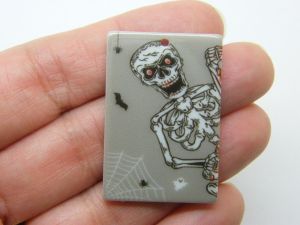 4 Skeleton Halloween pendants grey  acrylic HC1289