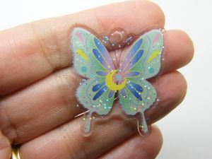 4 Butterfly pendants clear blue acrylic A