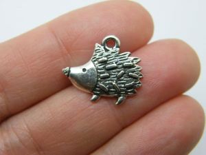 8 Hedgehog charms antique silver tone A279